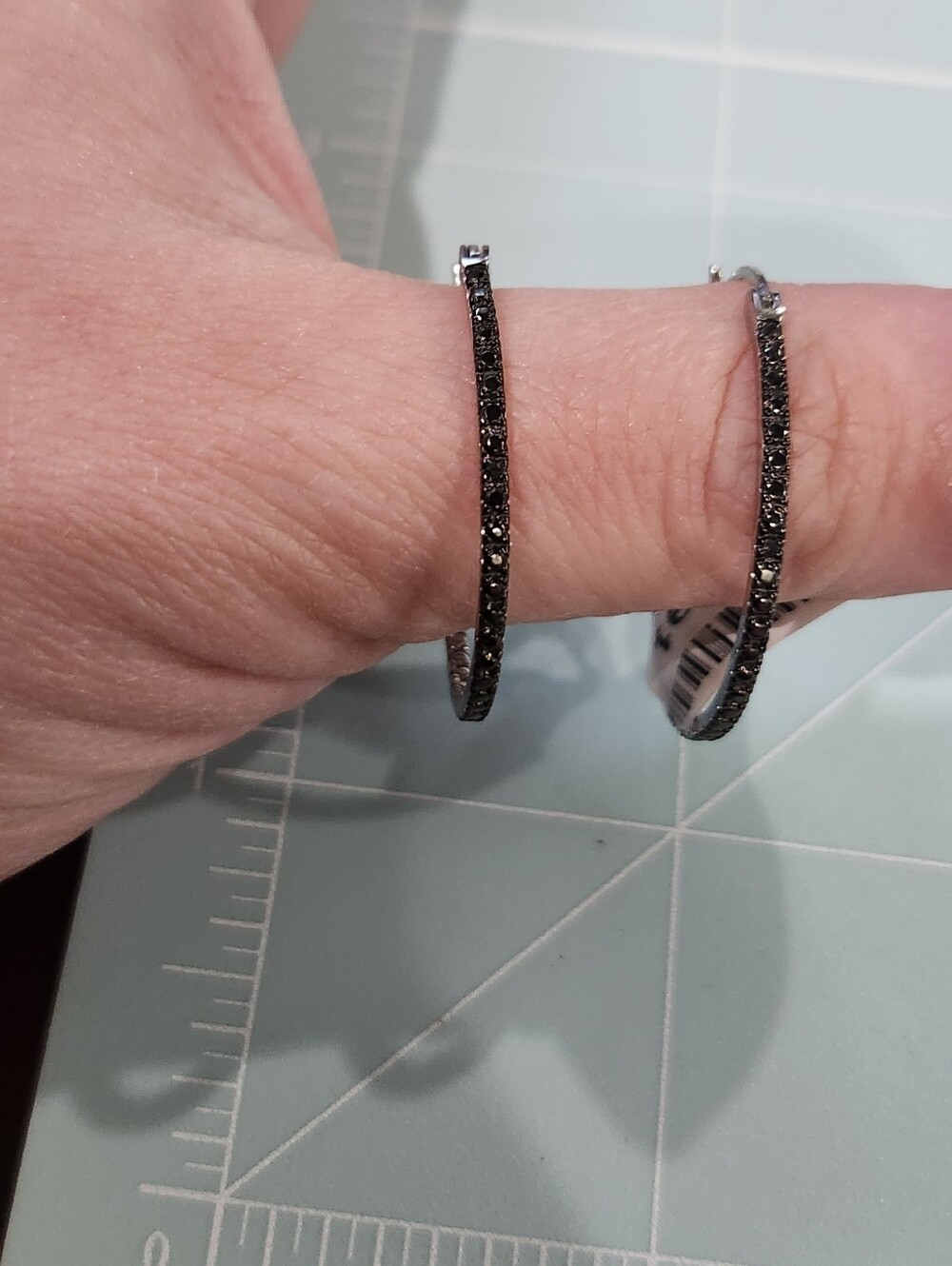 Sterling Silver Inside Out Hoop Earrings With Black And White Stones